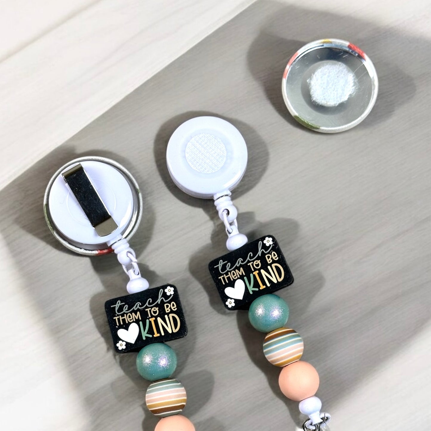 Teach Them To Be Kind Fabric Covered Badge Reel