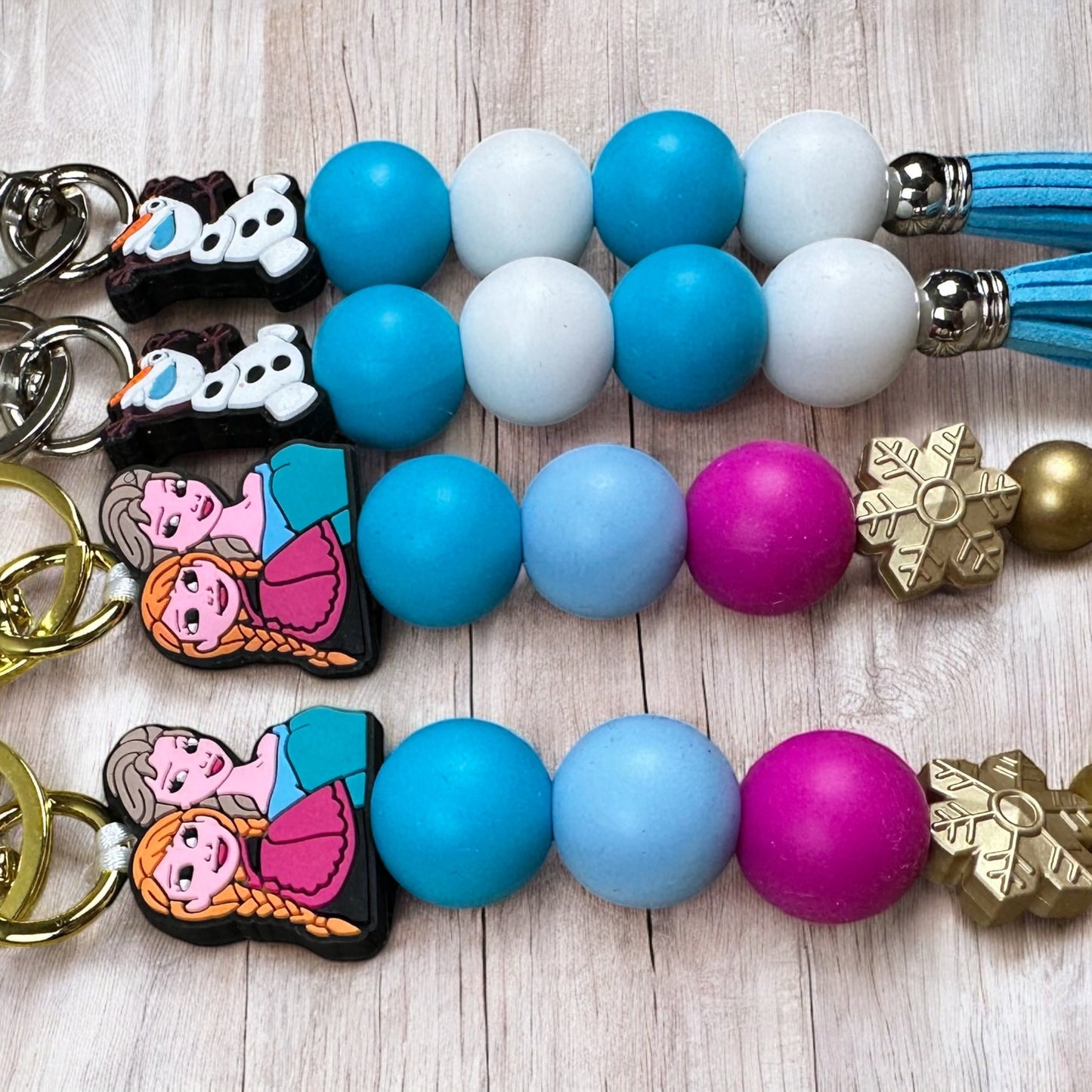 Frozen Sisters and Snowman Keychains