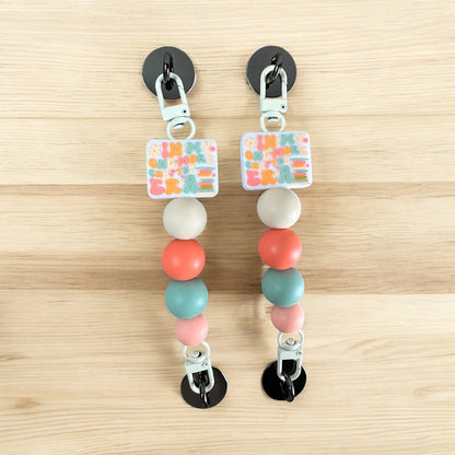 One More Chapter Era E-Reader Strap