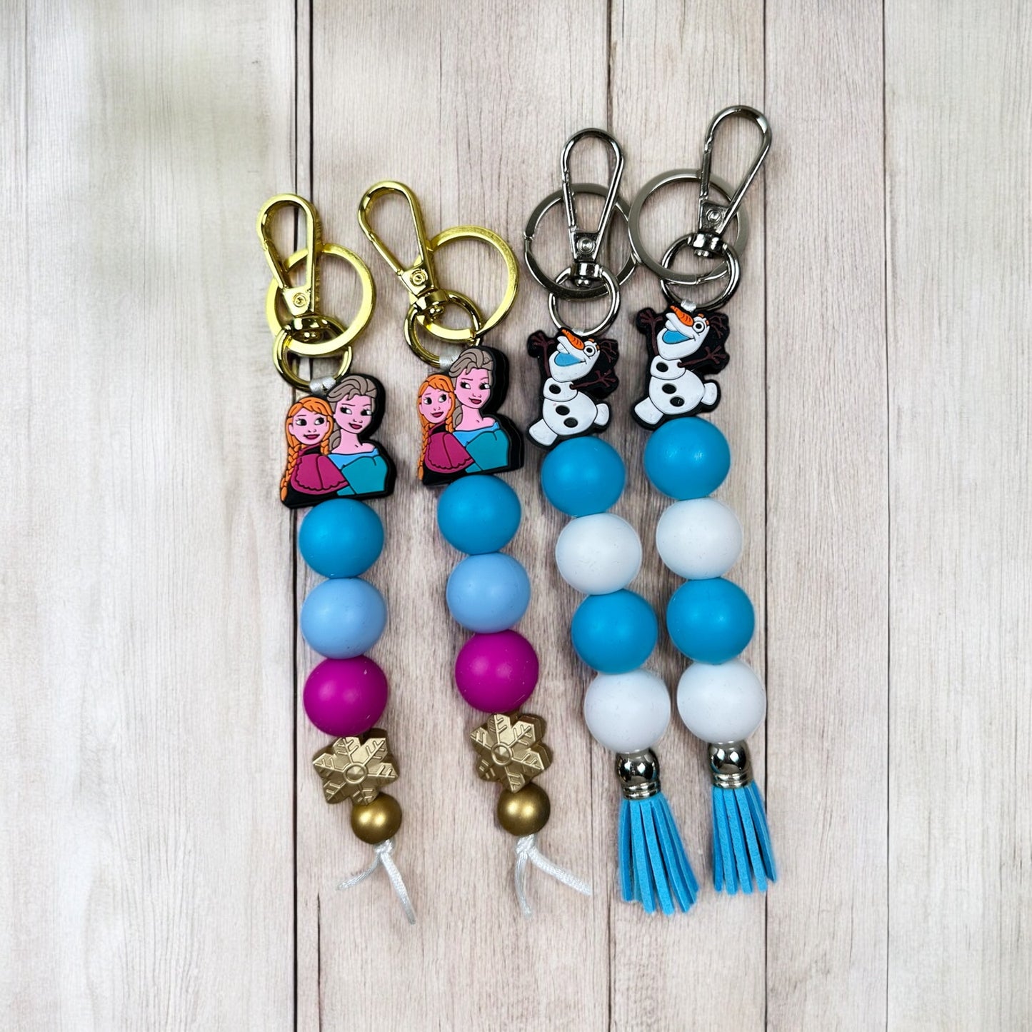 Frozen Sisters and Snowman Keychains