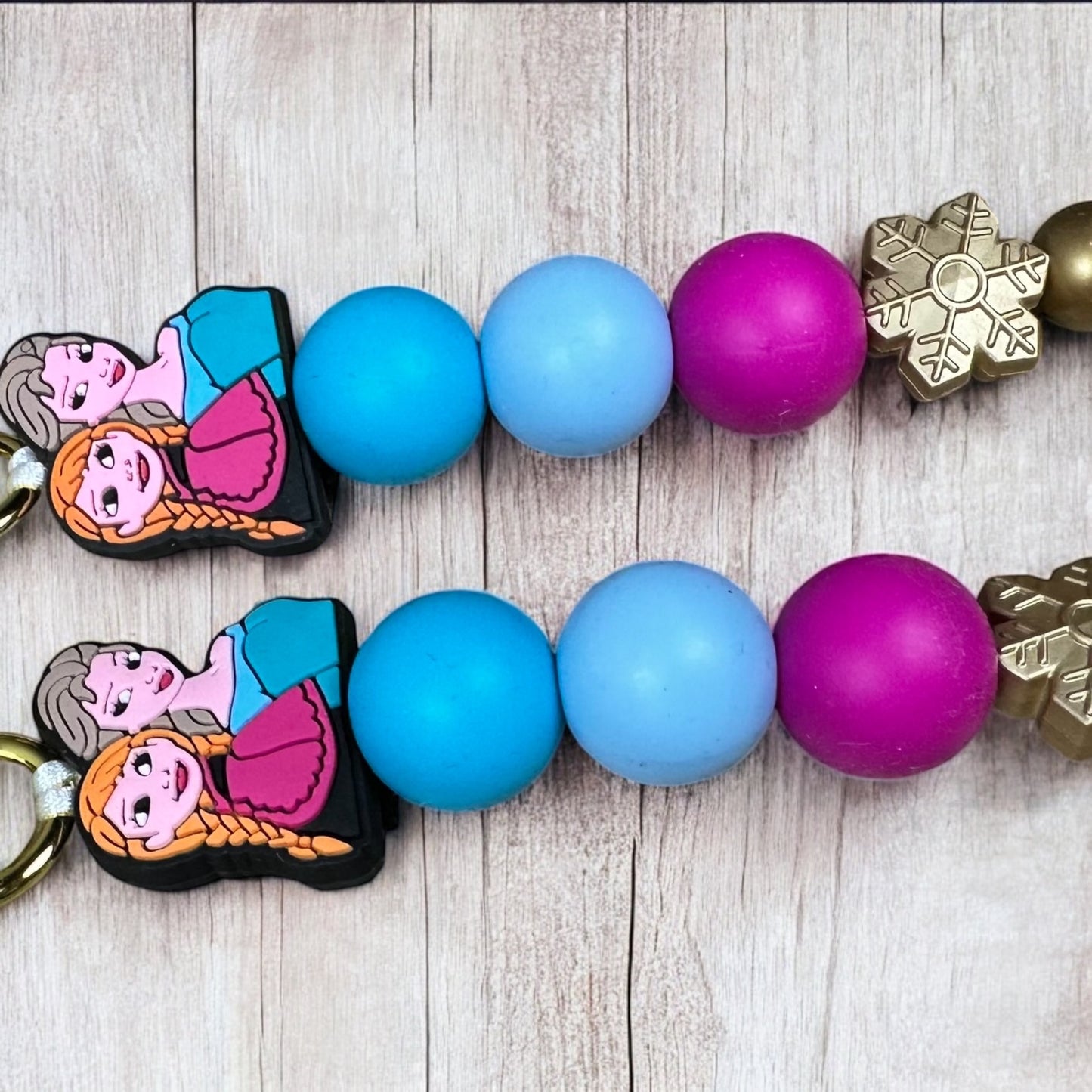 Frozen Sisters and Snowman Keychains